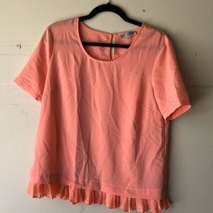 Coral blouse with pleated detail